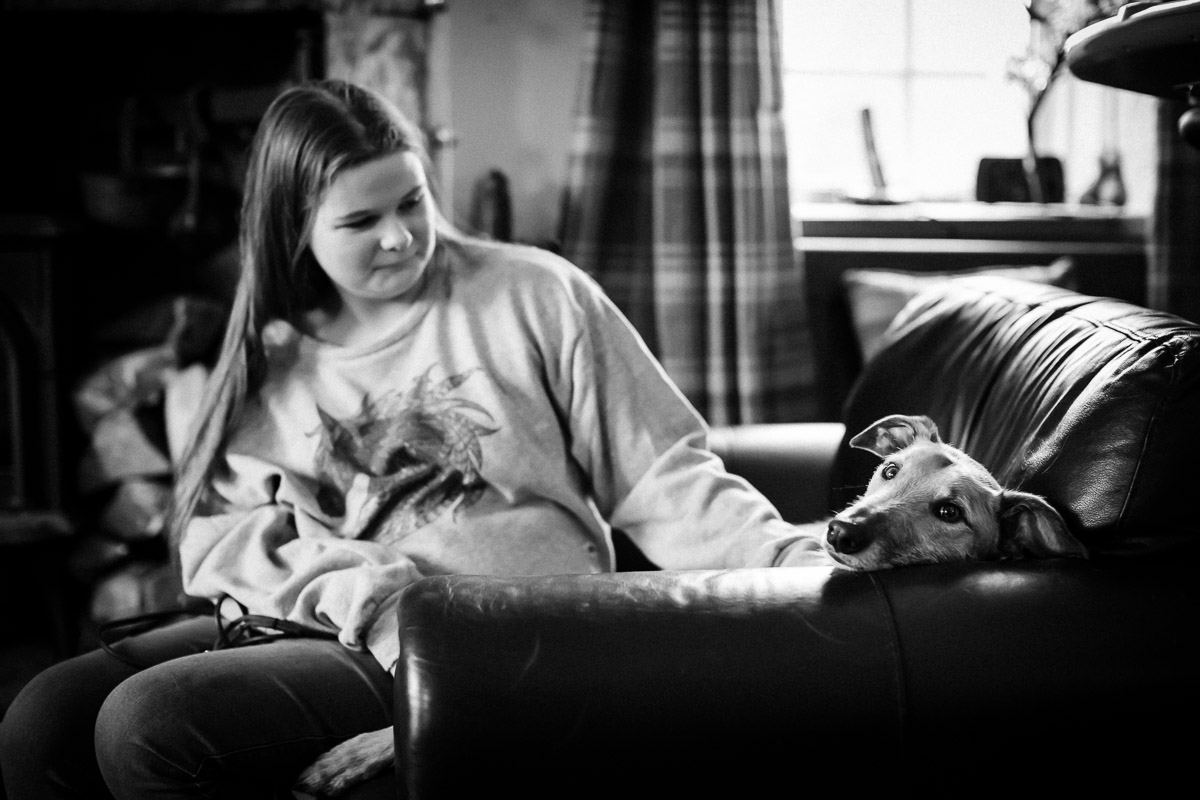 Teenage girl and dog in Berwick-upon-Tweed, Northumberland Family Photography